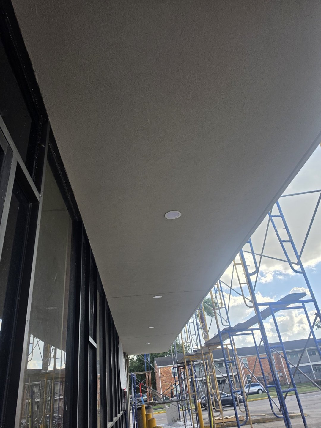 Covered walkway detail — Exterior ceiling texture and finish